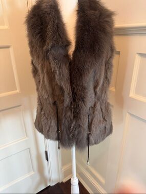 Stylish faux fur vest with leather belt